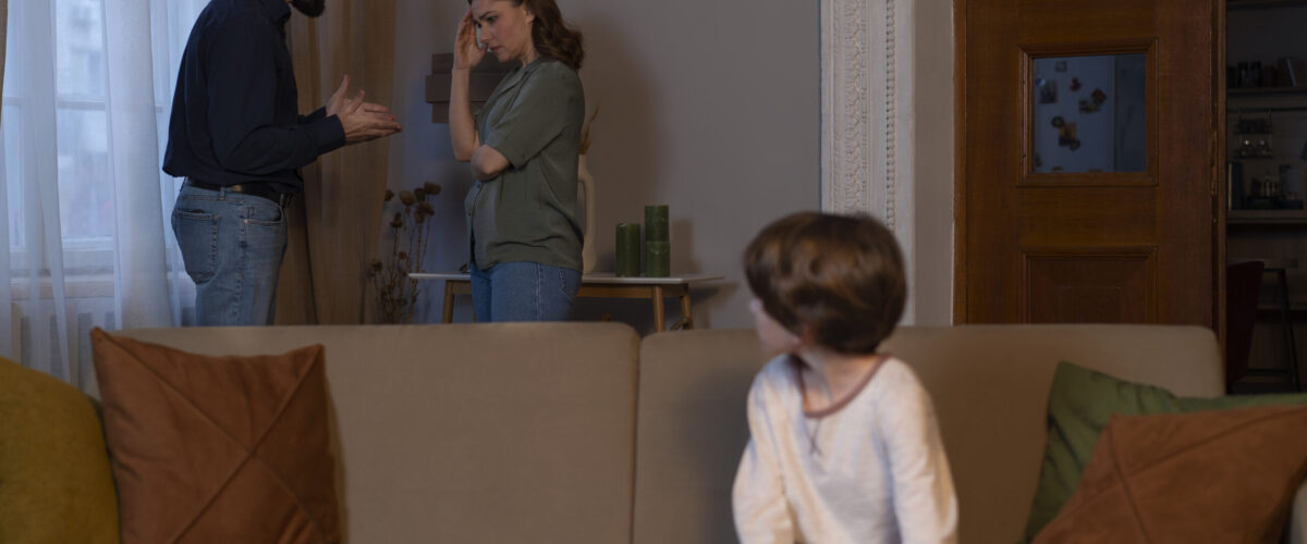 young-child-suffering-from-abuse-by-parents-fighting-home